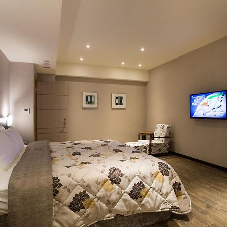 VeryGood Business Hotel Huatan Zimmer foto