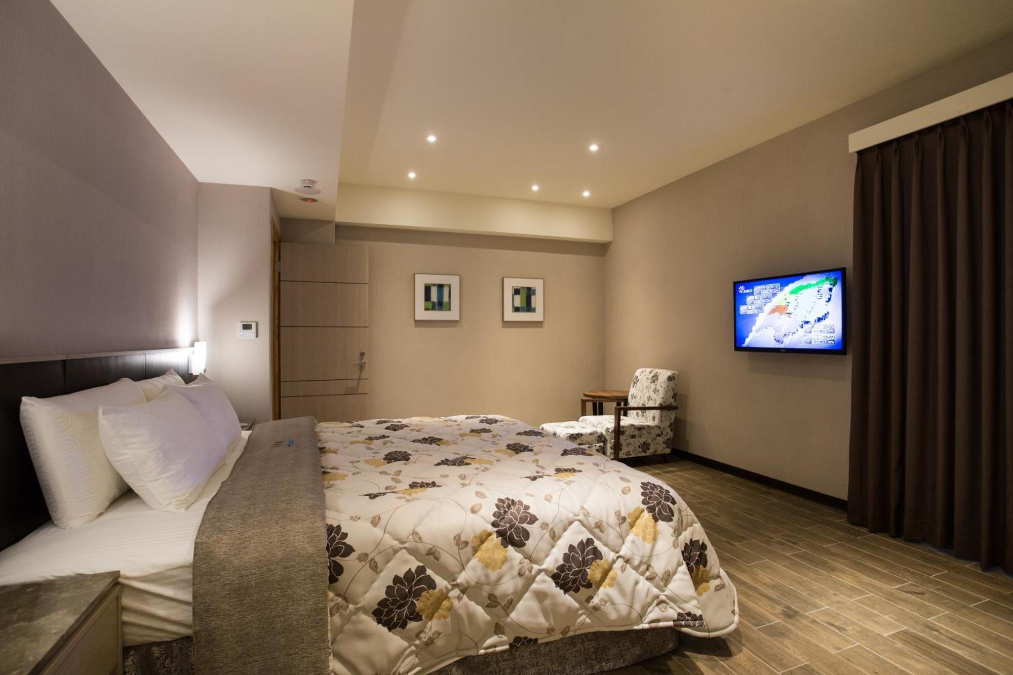 VeryGood Business Hotel Huatan Zimmer foto