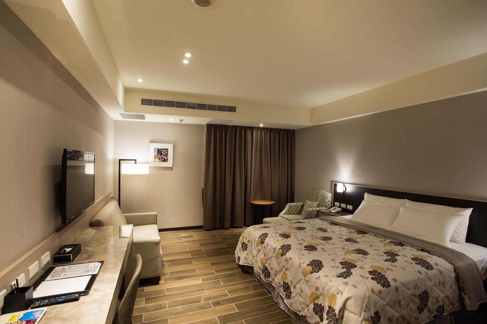 VeryGood Business Hotel Huatan Zimmer foto