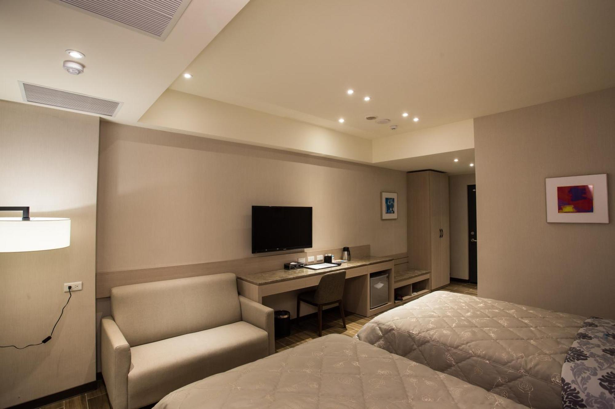 VeryGood Business Hotel Huatan Zimmer foto