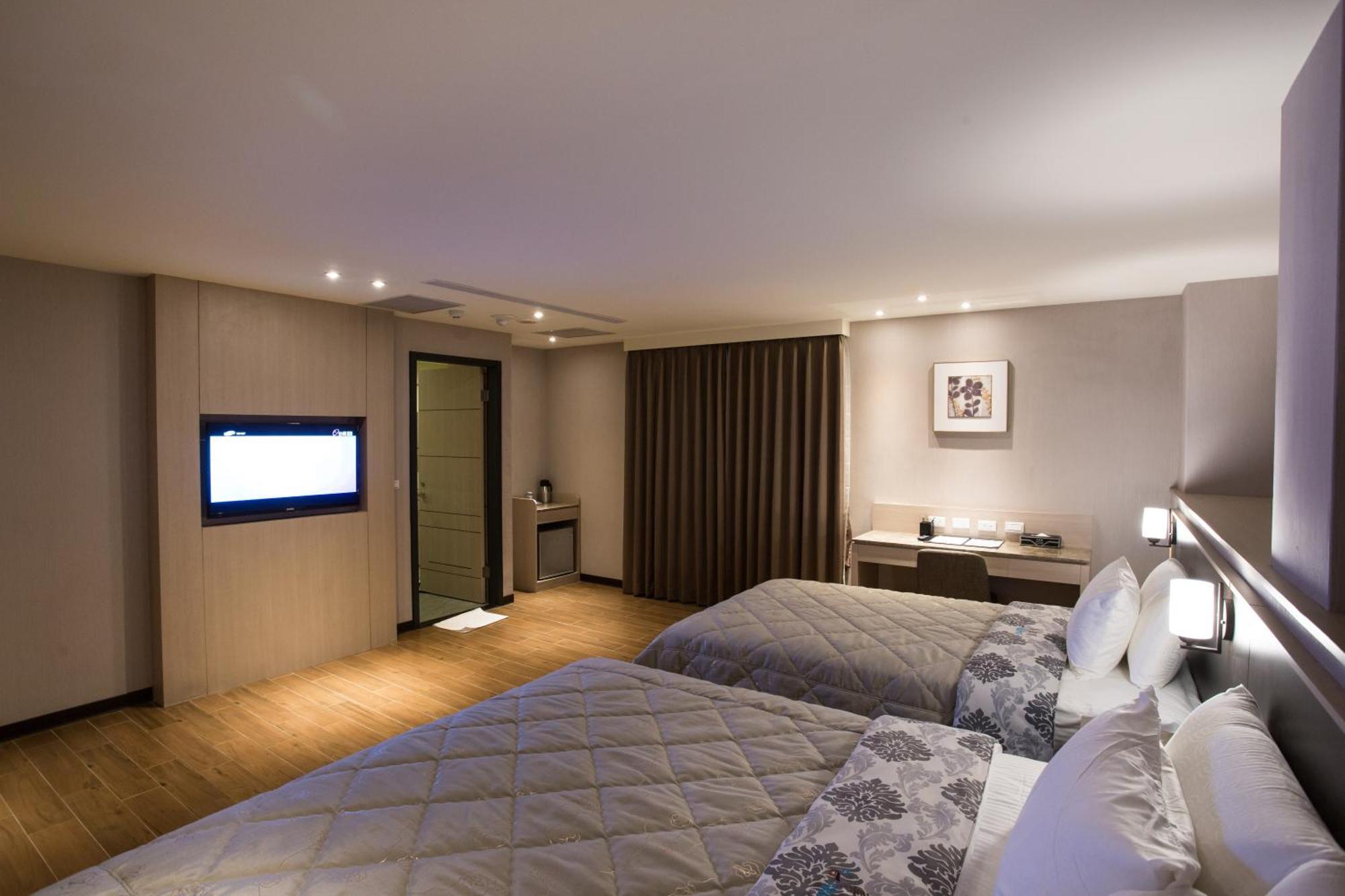 VeryGood Business Hotel Huatan Zimmer foto