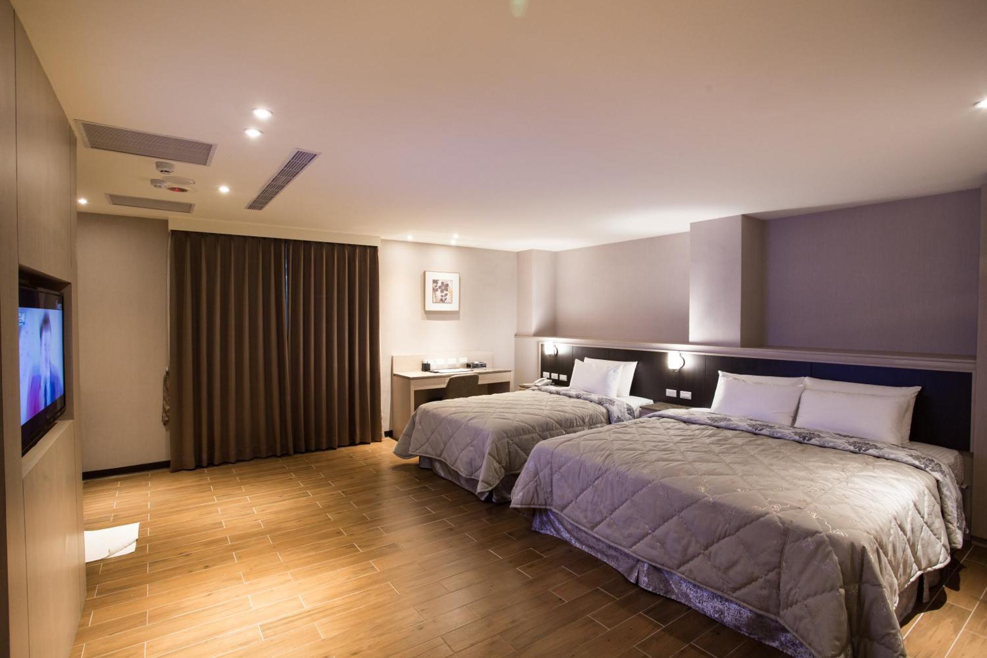 VeryGood Business Hotel Huatan Zimmer foto