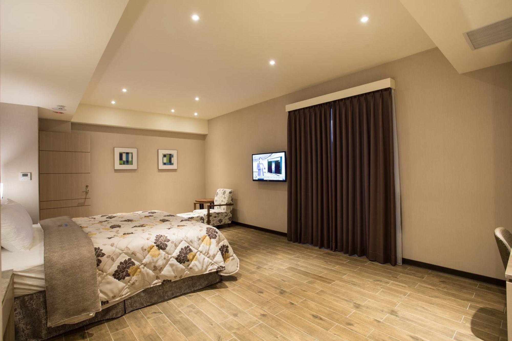 VeryGood Business Hotel Huatan Zimmer foto